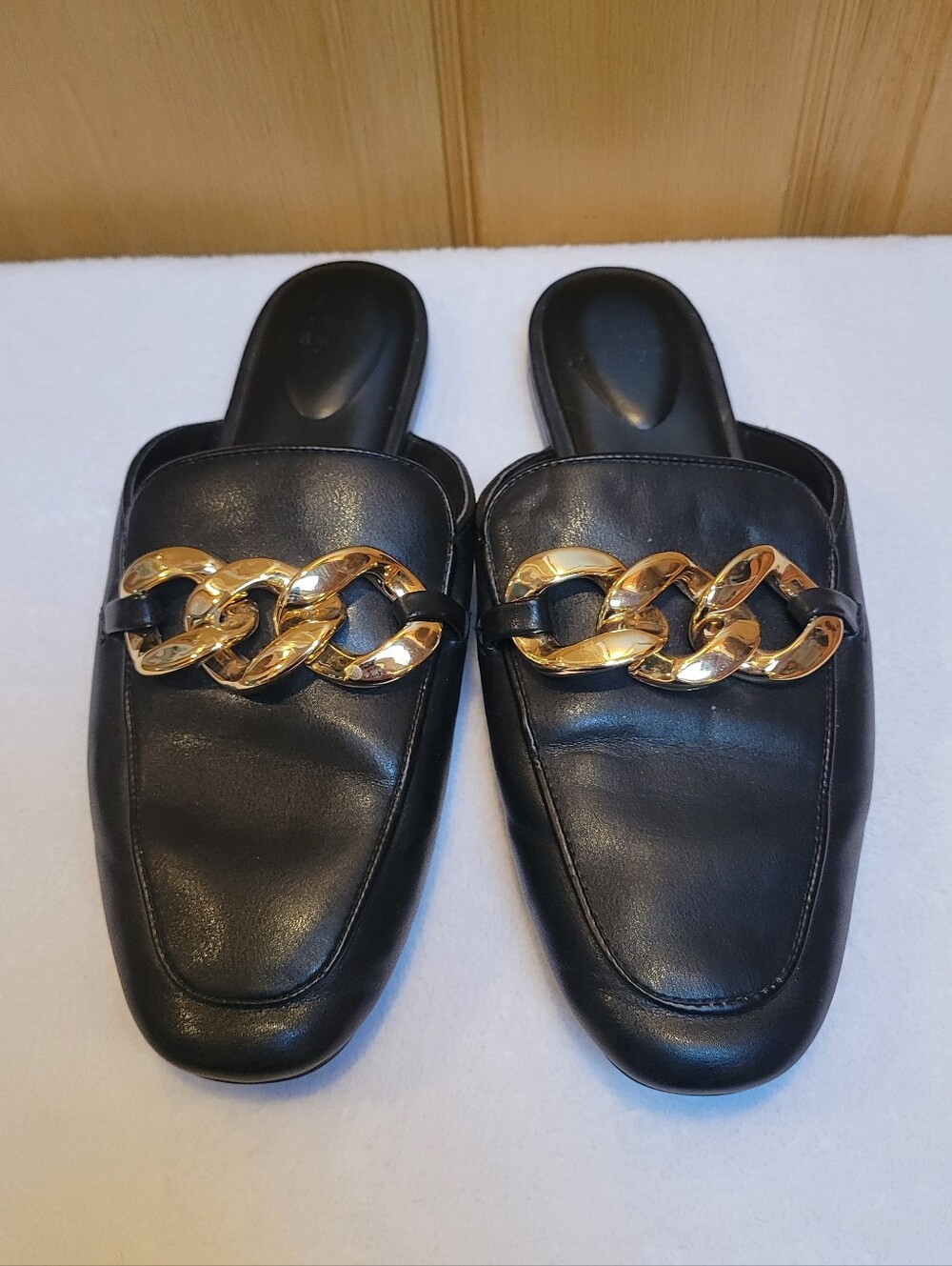 Black Leather Slide Loafers with Gold Chain Accent